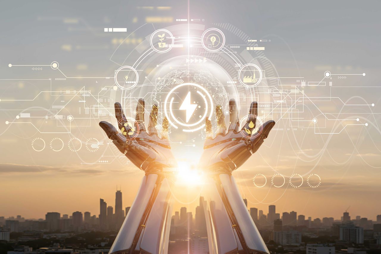 braccia e mani robotiche che tengono virtualmente in mano icone inerenti l'energia