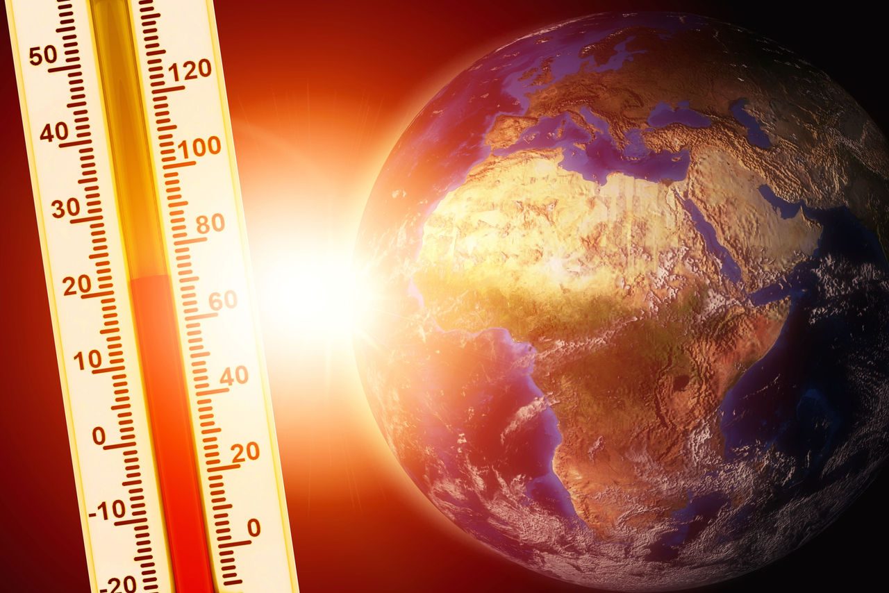 mondo e termometro che indica il riscaldamento globale