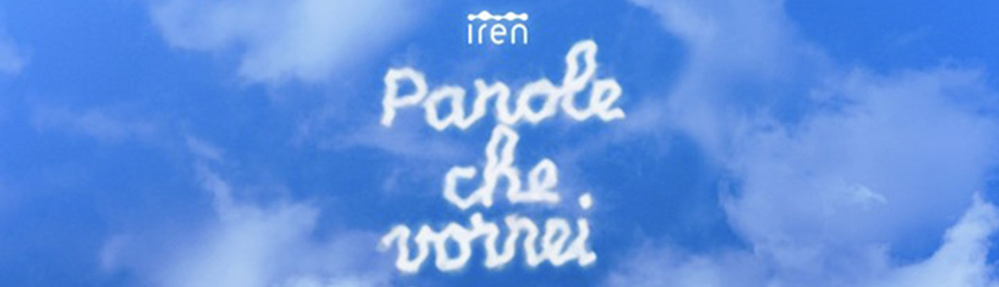 Scritta "Parole che vorrei" formata da lettere a nuvola nel cielo azzurro, accompagnata dal logo Iren.